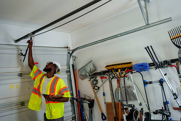 Professional Garage Door Panel Replacement technician working in East Basin, UT
